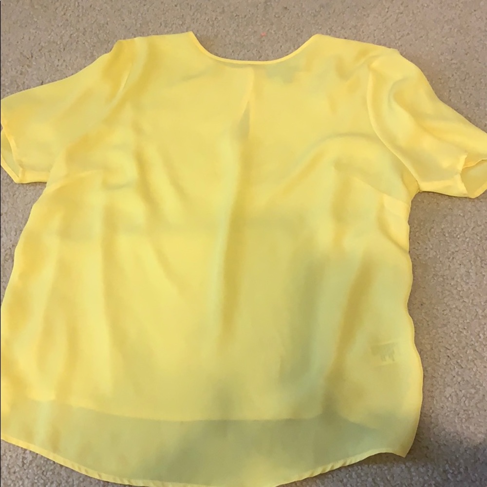 Bright yellow blouse